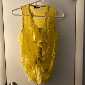 Medium yellow button up top